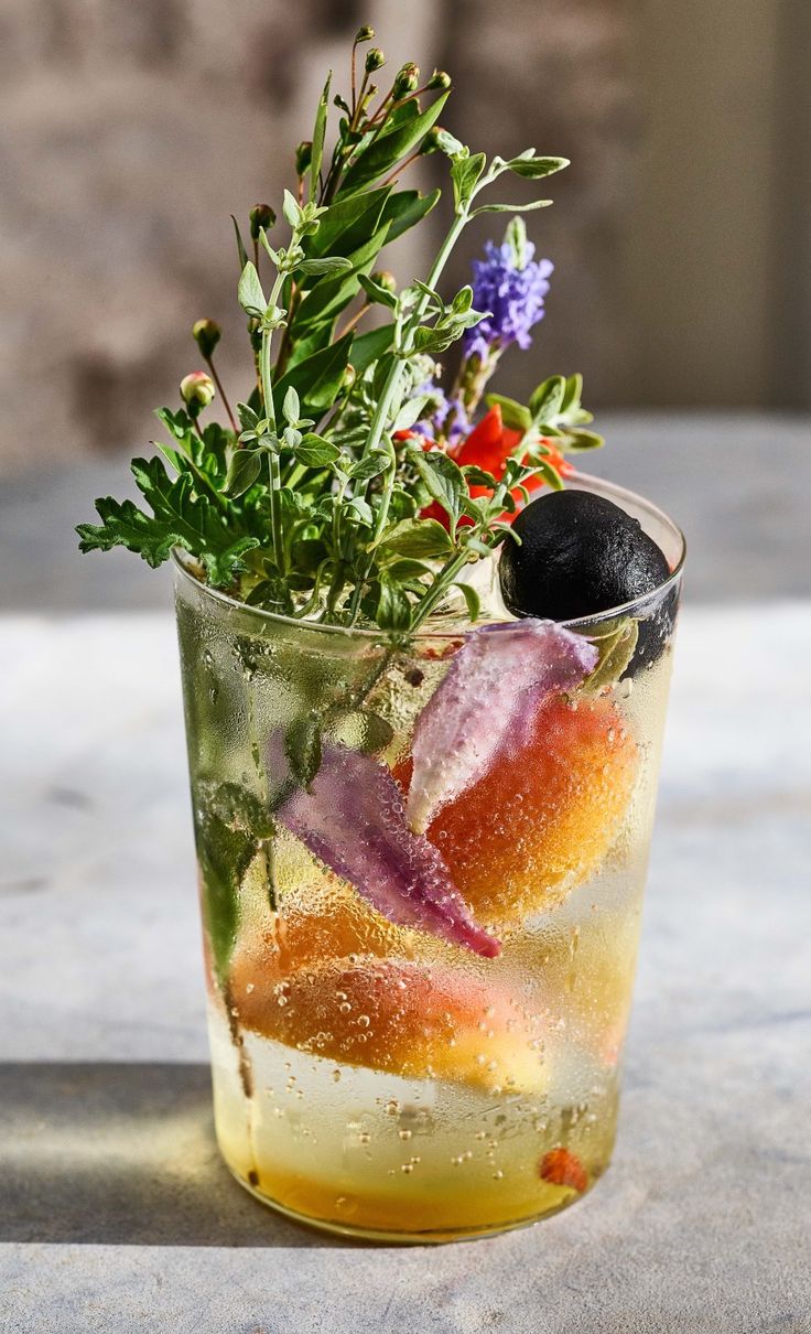 A summer drink infused with herbs, fruits and florals