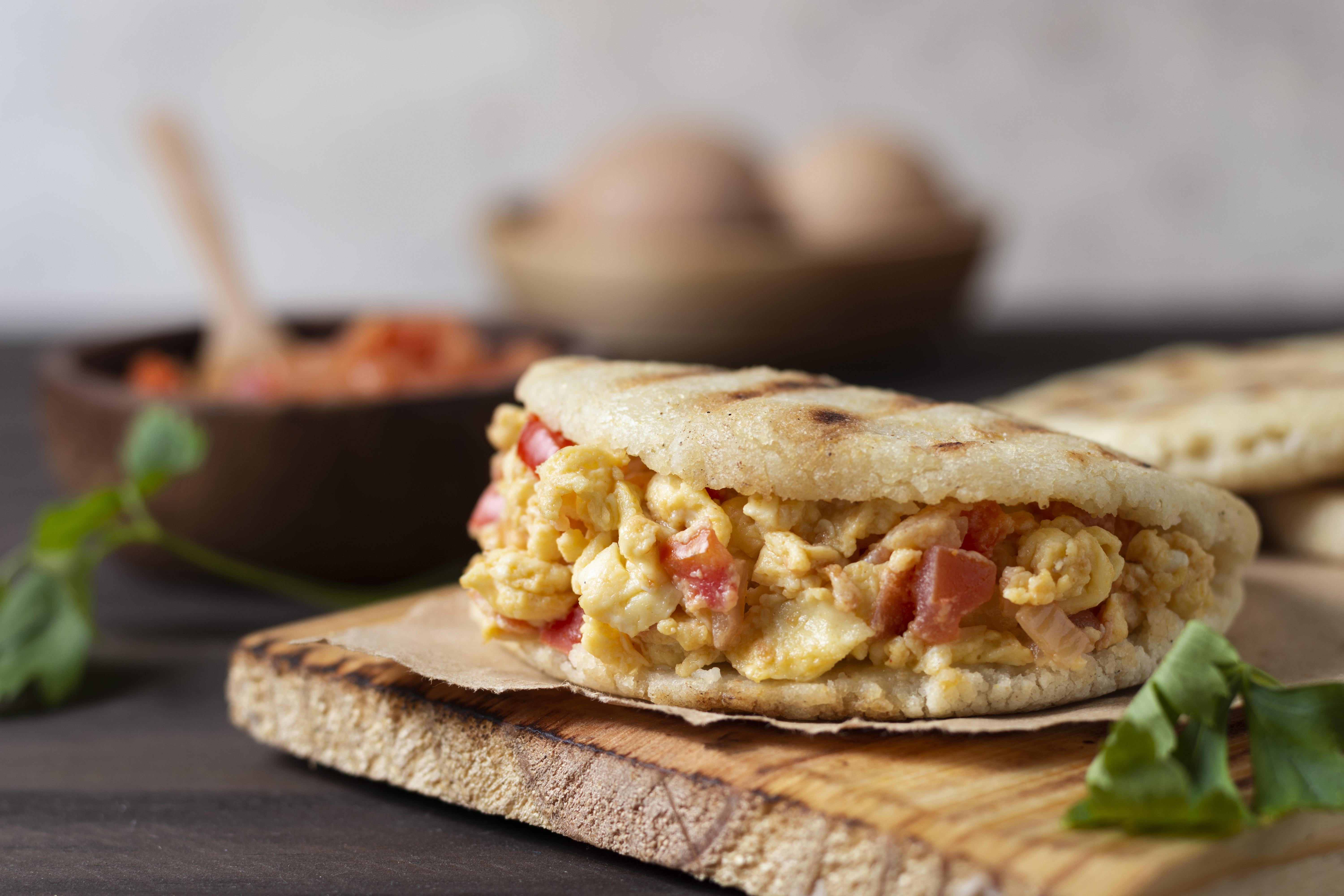 Pita pockets stuffed with scrambled eggs