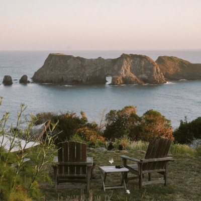 A scenic place with two chairs and table