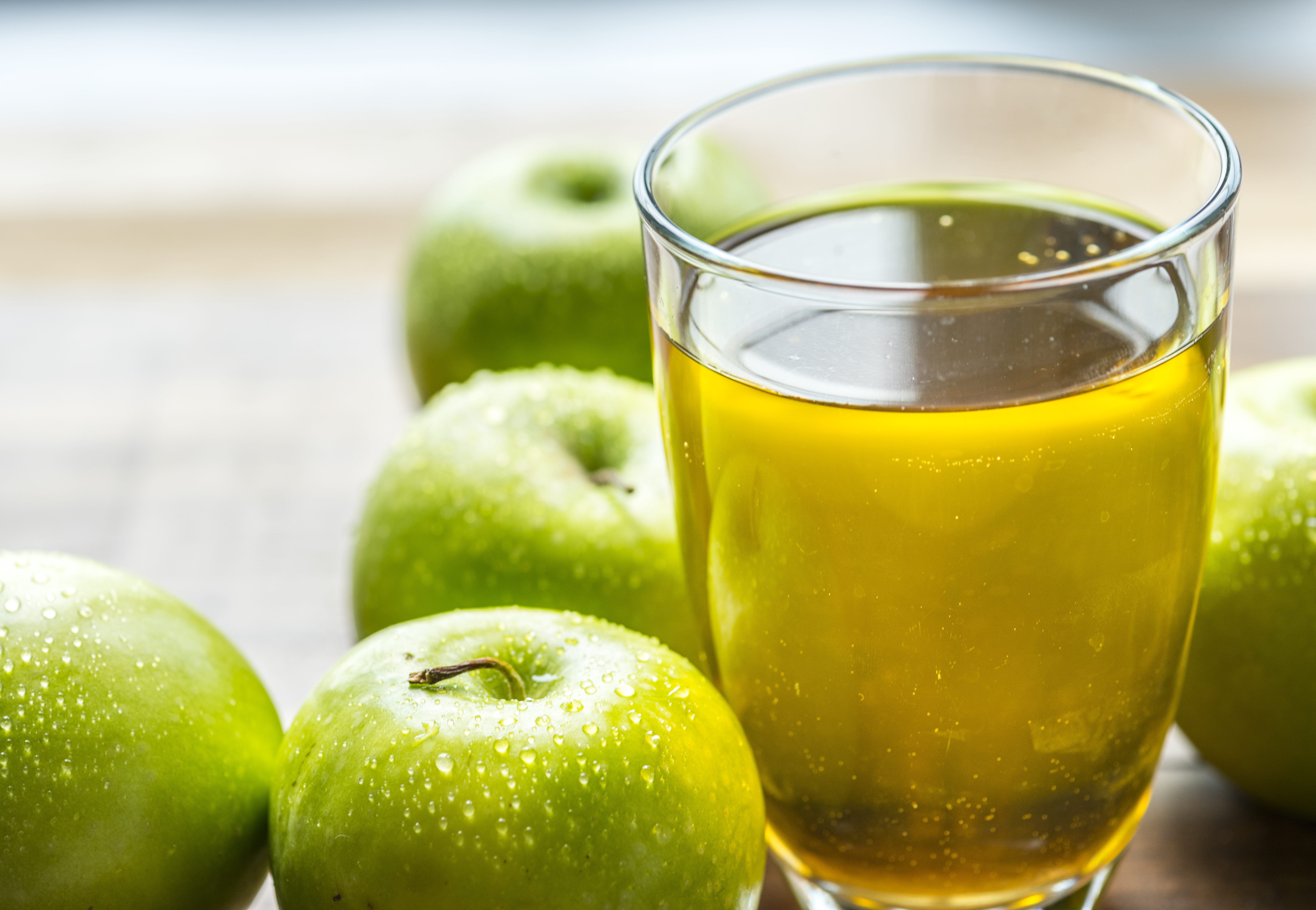 Glass of green apple juice