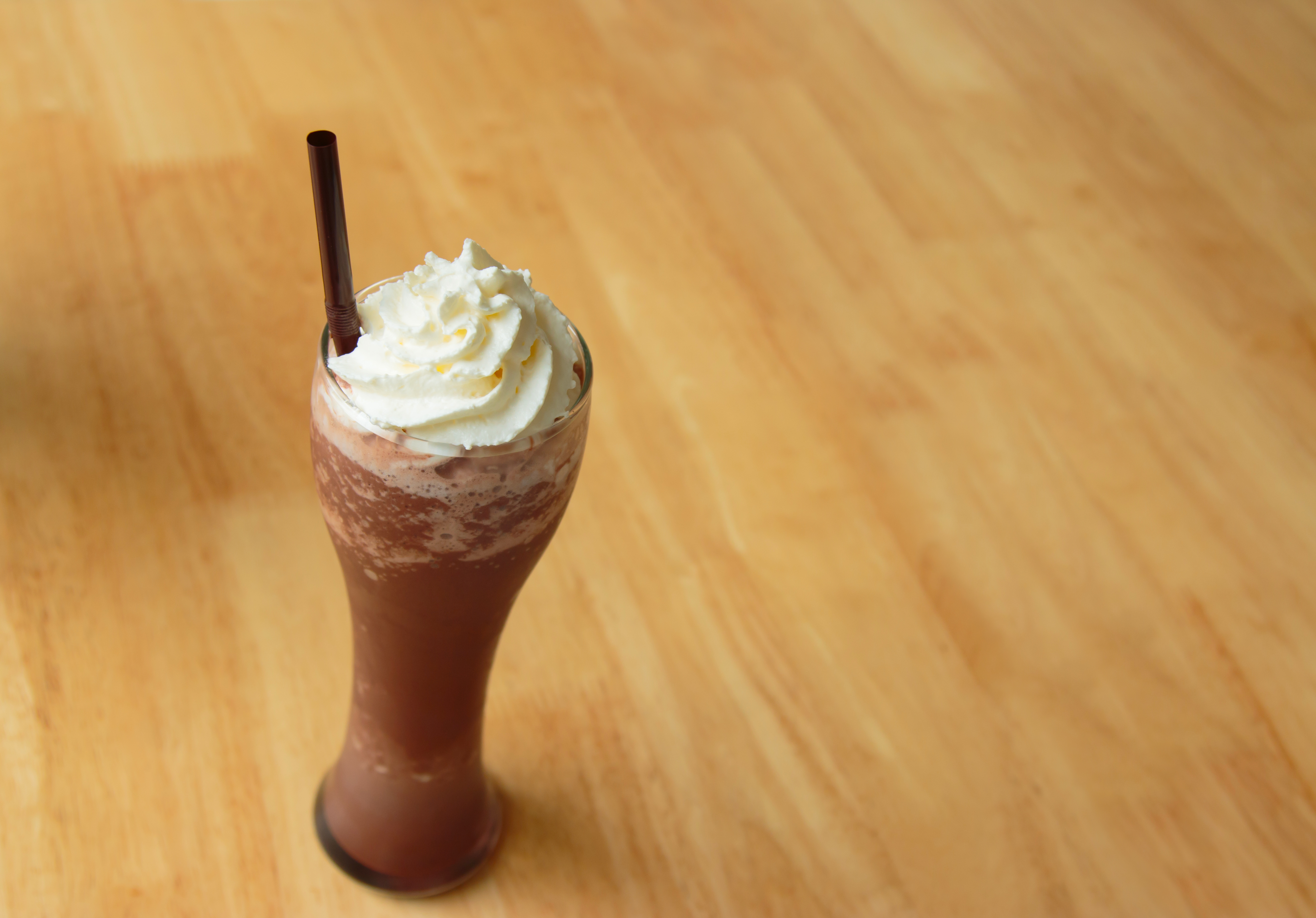 Thick chocolate milkshake with whipped cream
