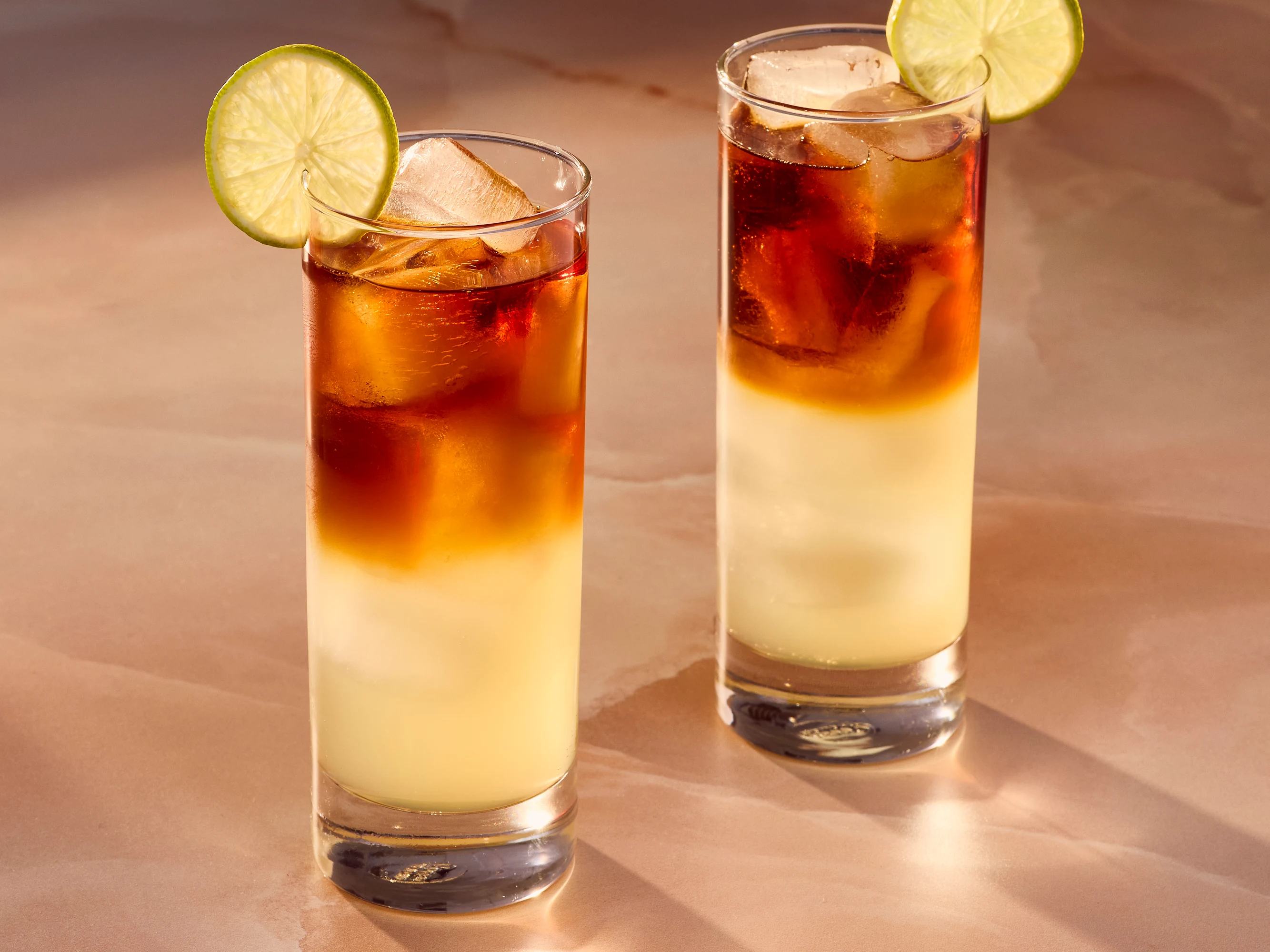 Dark rum with ginger beer garnish