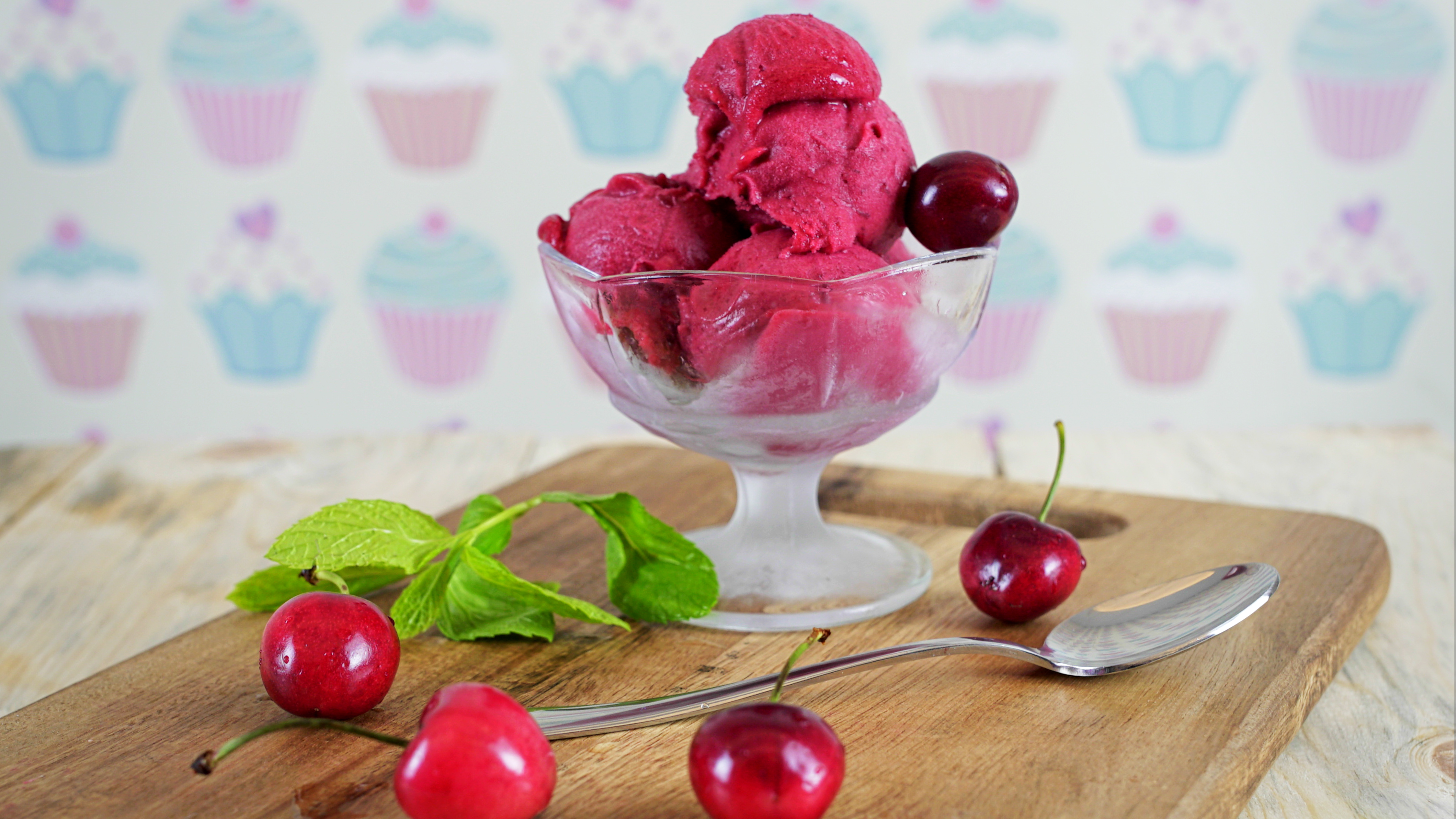 Pink cherry sherbet in chilled bowl