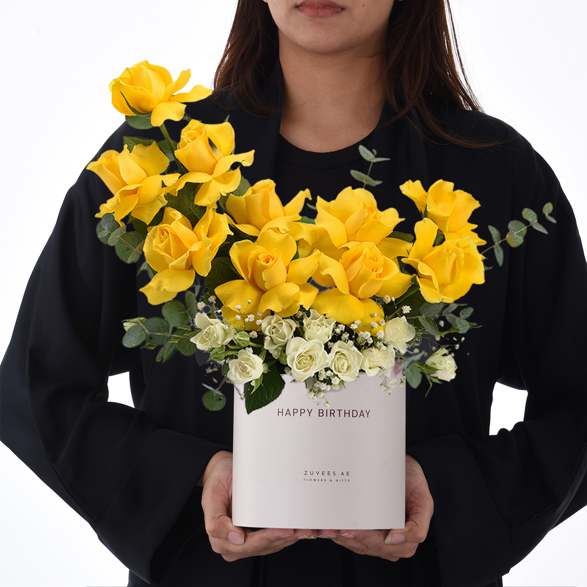 Girl holding yellow flower box