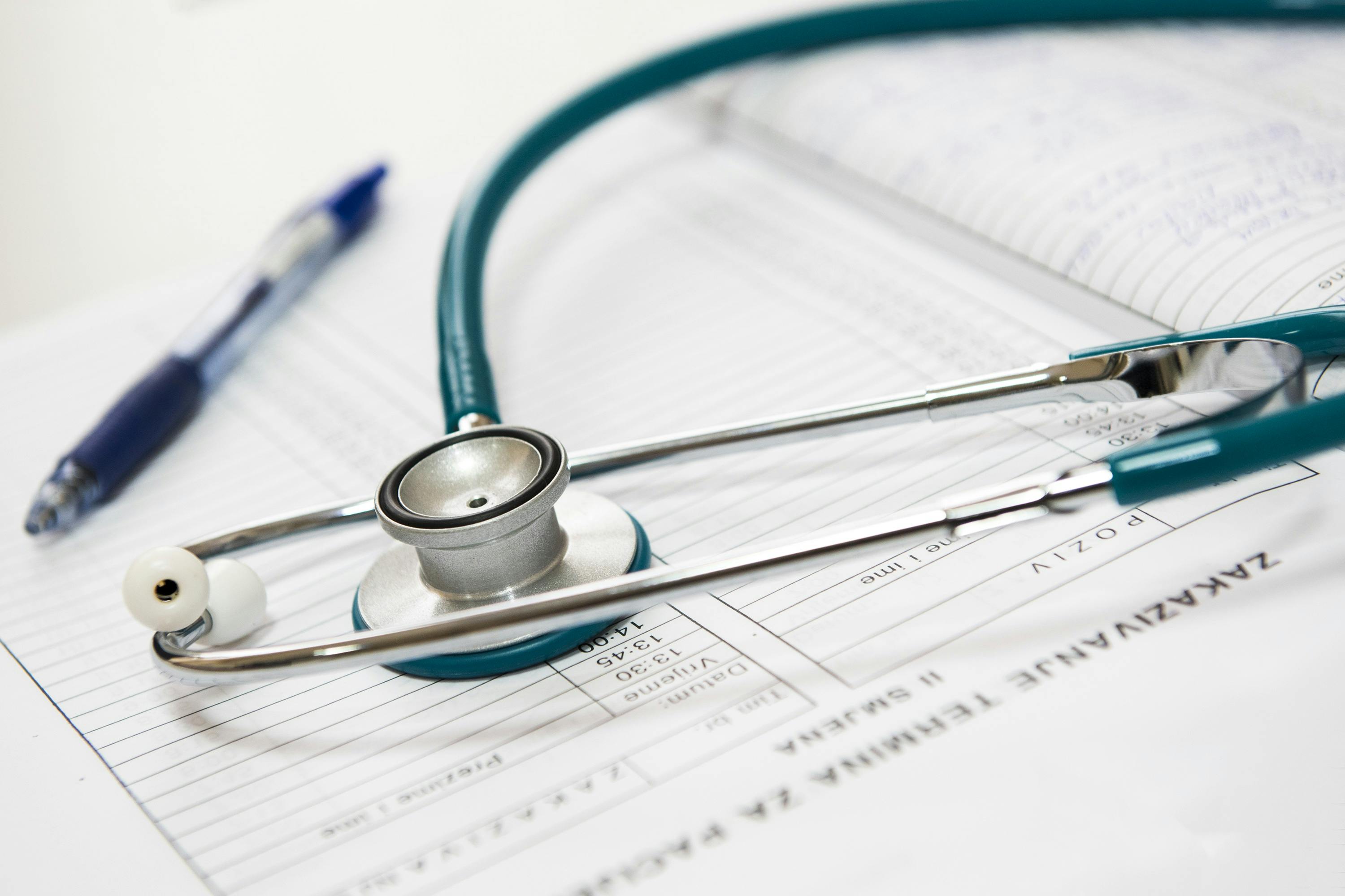 Stethoscope and pen resting on a medical chart at Royal Wound Care, symbolizing detailed patient assessments and precision in wound treatment documentation. Stethoscope and pen resting on a medical chart at Royal Wound Care, symbolizing detailed patient assessments and precision in wound treatment documentation.