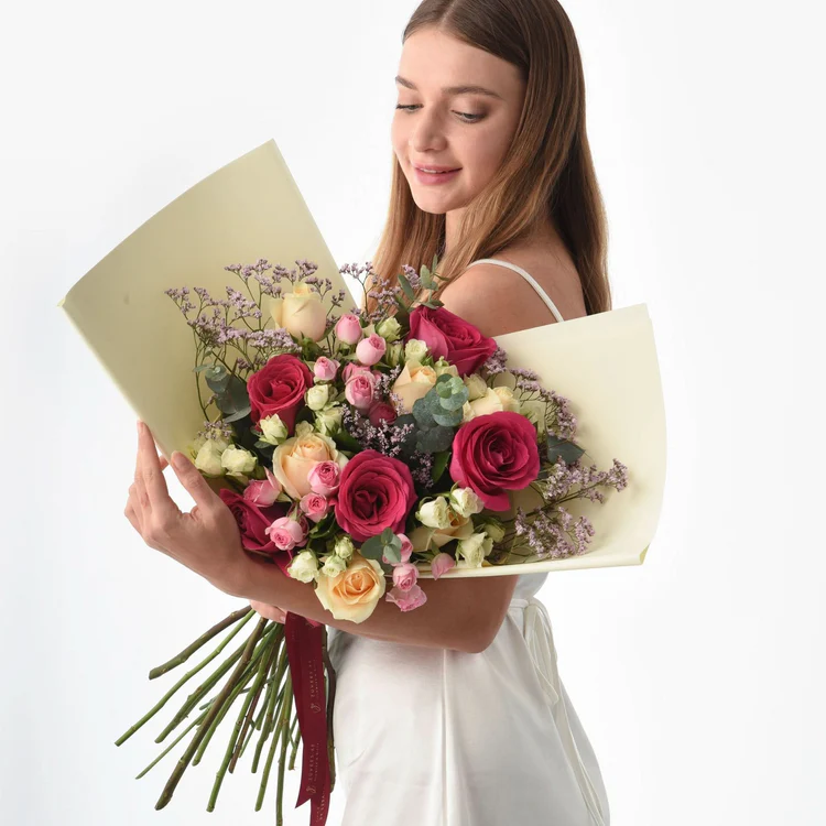 girl holding beautiful bouquet