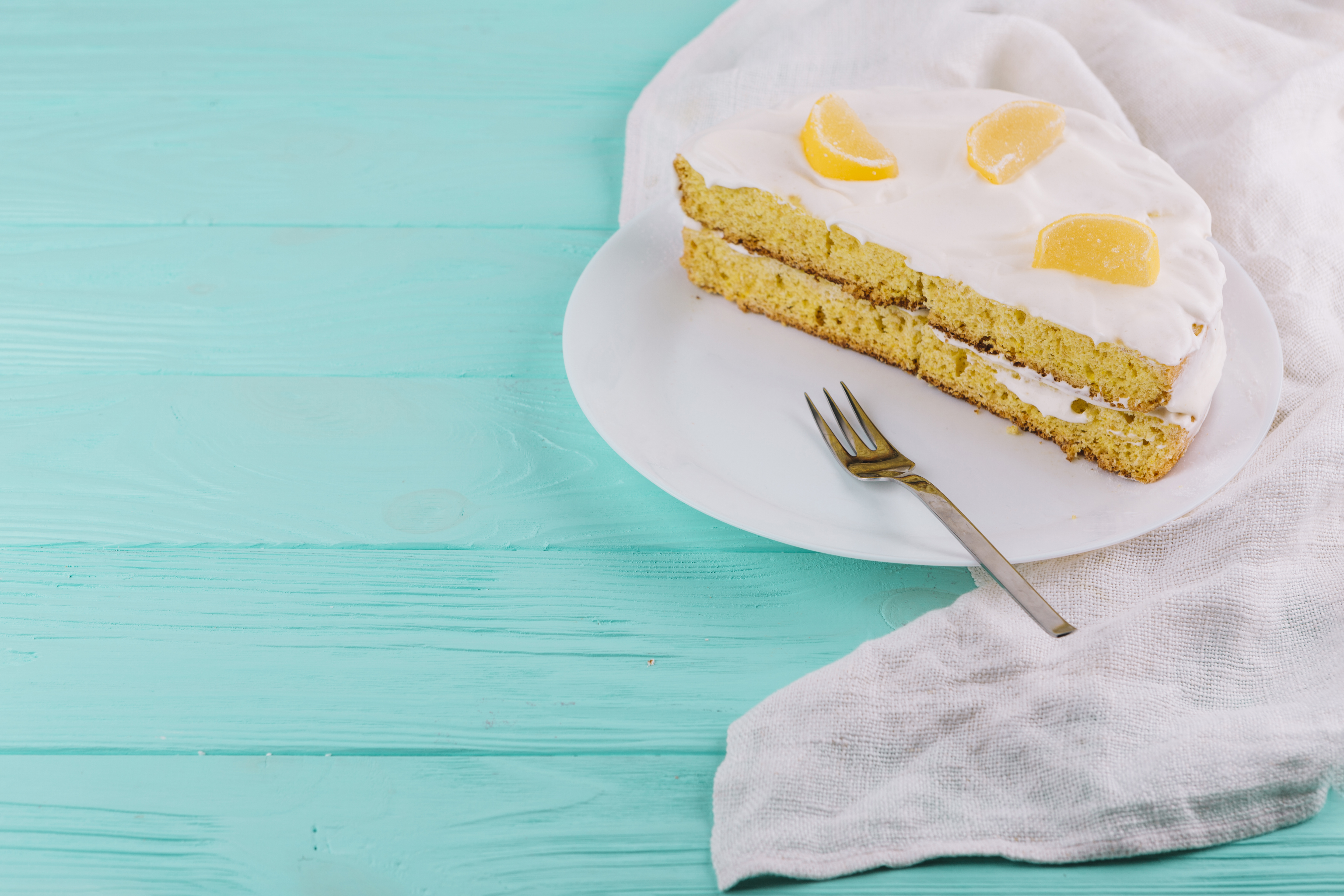 Lemon poppy seed sheet cake slice