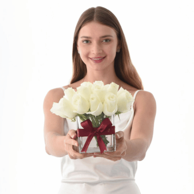 Lady holding Flowers in a Vase