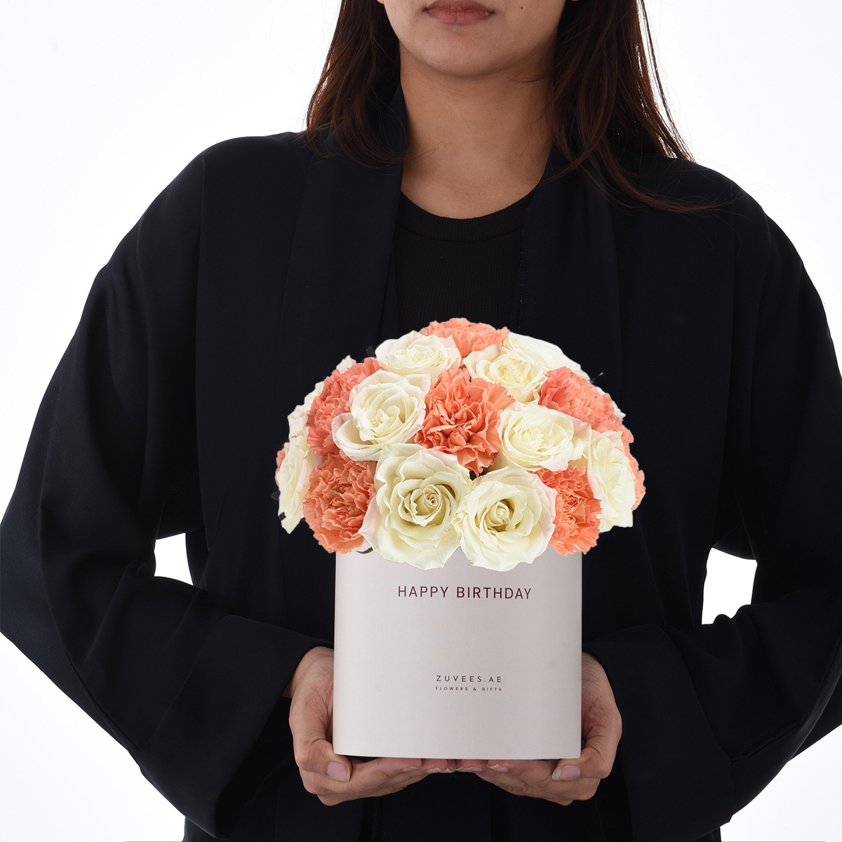 girl holding flower box