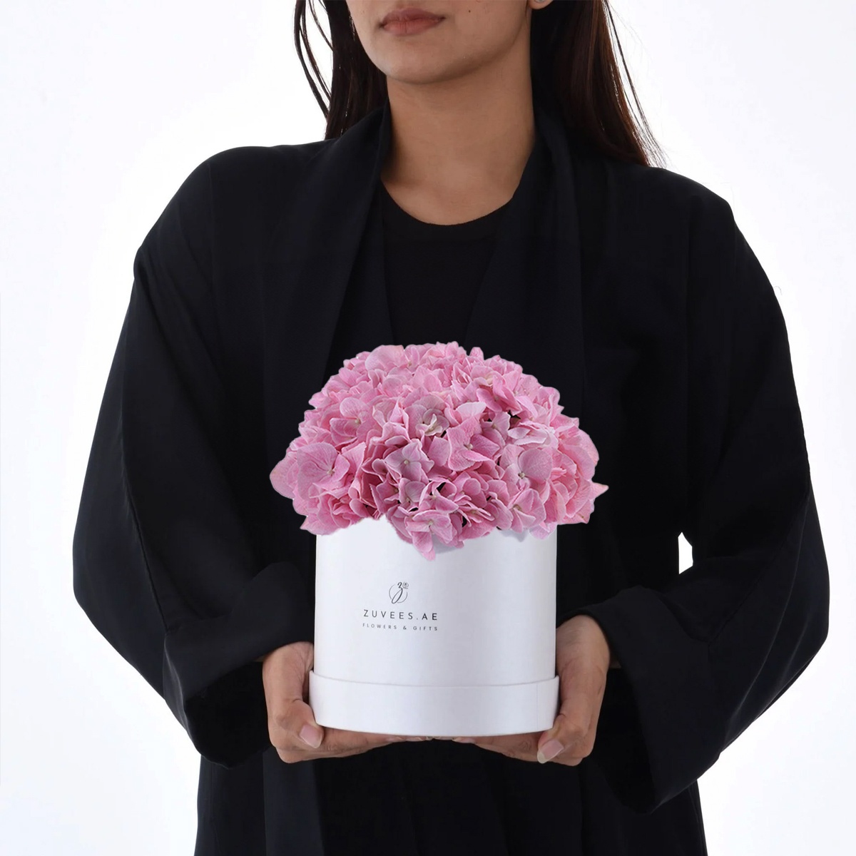 Girl holding flower box
